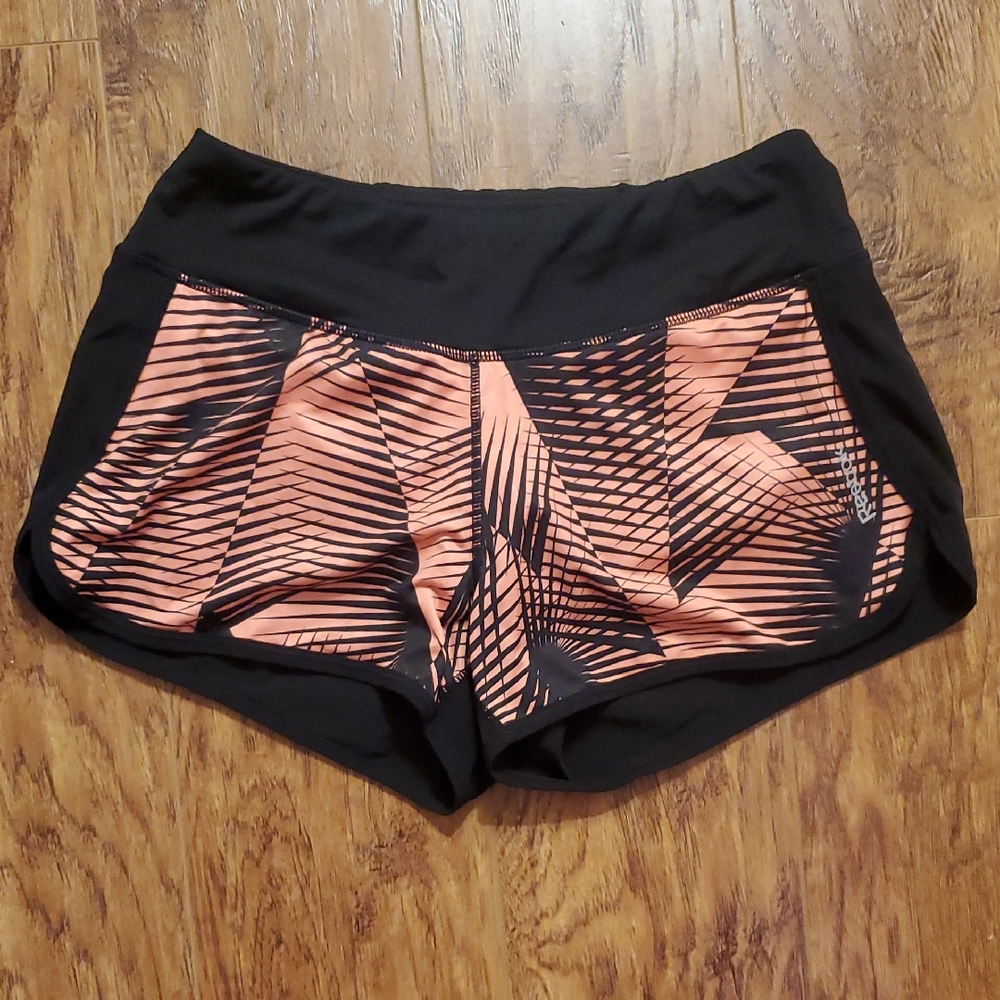 Reebok Orange and Black Athletic Shorts with Dynamic Design